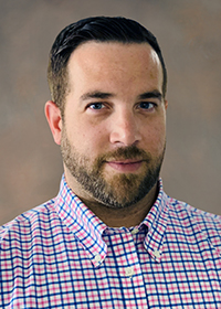 ERIC BOND PROMOTED TO ASSOCIATE